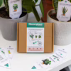 Keep your houseplants thriving with these handy care tags, available at The Loving Company. Houseplant Care Tags, displayed in a box with care tags for different plants