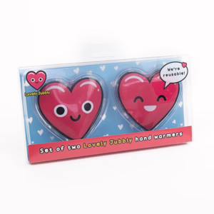 Keep your hands warm and cozy with these adorable heart-shaped hand warmers! Heart-shaped hand warmers with smiling faces, available at The Loving Company.