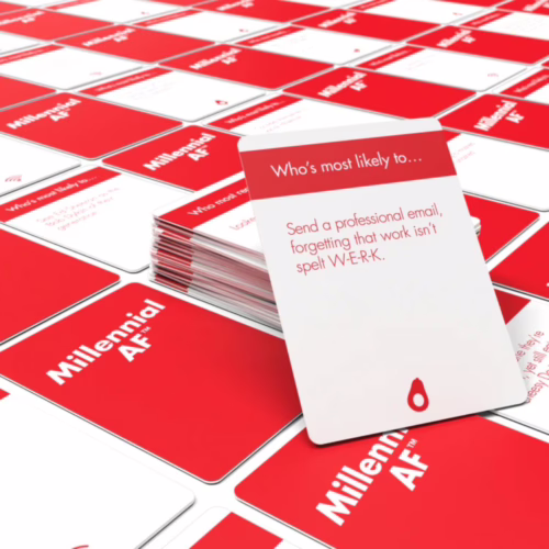Discover the humor of millennial experiences with the 'Millennial AF' card game. Red cards from the 'Millennial AF' card game, with one card asking 'Who's most likely to
