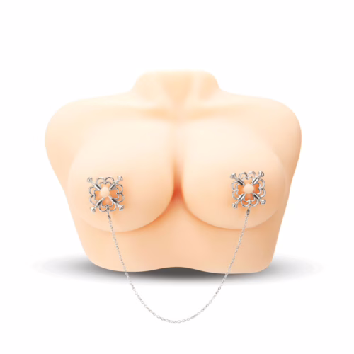 Silver flower design nipple chain on a mannequin bust