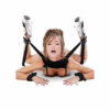 A woman in a playful pose using the Fetish Fantasy Series Position Master with cuffs