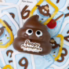 Dive into laughter with the Poopy Mcpoopface card game, a hilarious choice for family game night! Poopy Mcpoopface game with a smiling poop figure and colorful cards available at The Loving Company.