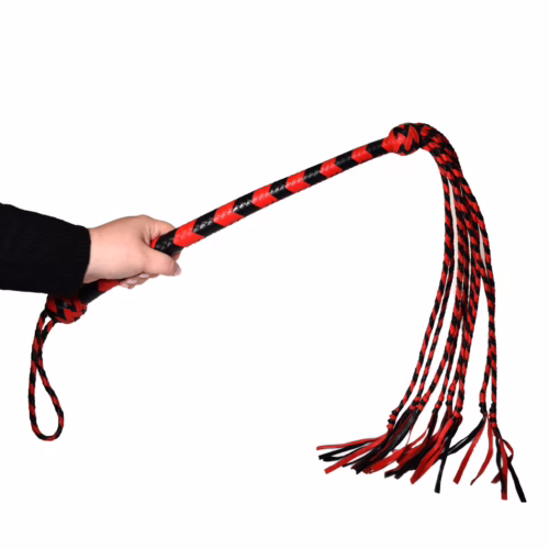 Prowler Red Long Handle Flogger in black and red, held in a hand