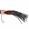 Prowler Red Leather and Wood Fringe Paddle - Black, One Size, held in a hand