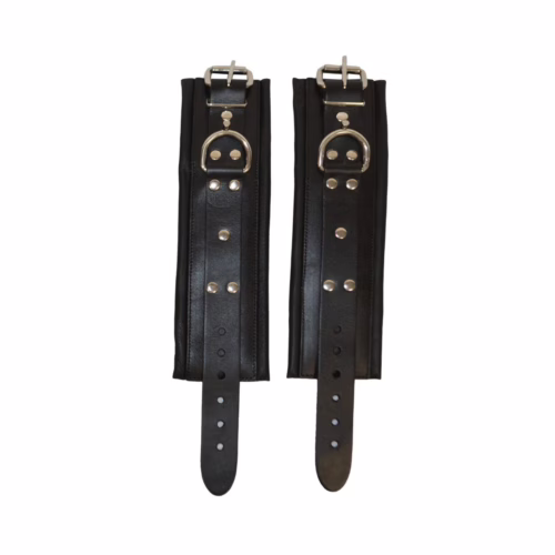 Prowler Red Leather Lockable Wrist Restraints in black, featuring buckles and rivets