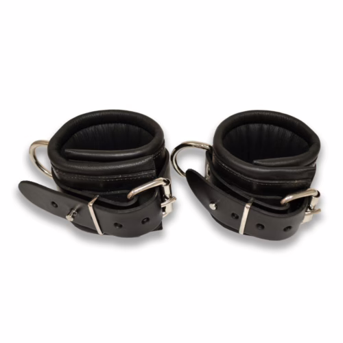 Black leather lockable wrist restraints with metal buckles