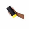 Romp Dash Masturbator in hand, featuring a black design with a yellow base
