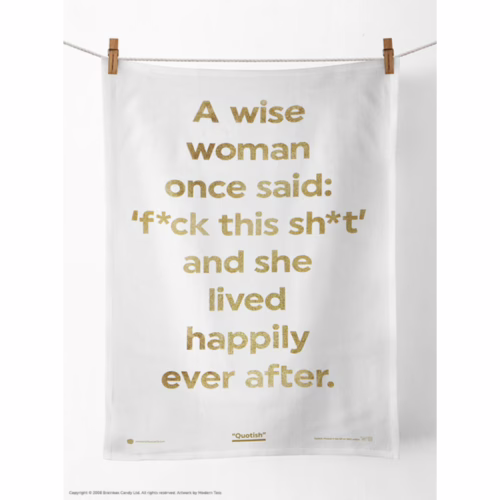 Add a touch of humor to your kitchen with this wise woman tea towel. A white tea towel with gold text reading, 'A wise woman once said: f*ck this sh*t and she lived happily ever after.' Avail...