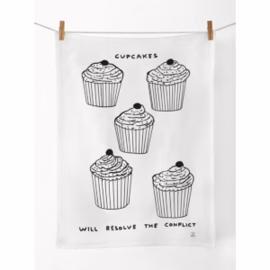 Brighten your kitchen with this whimsical David Shrigley tea towel featuring delightful cupcakes. Illustration of five cupcakes with text 'cupcakes will resolve the conflict' available at The Loving Company.