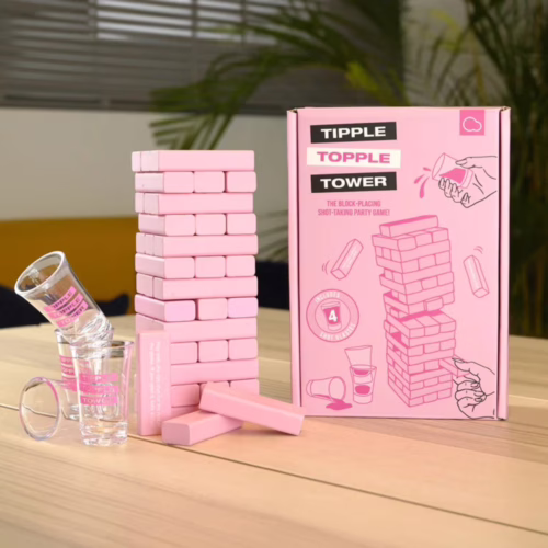 Tipple Topple Tower Party Game with pink blocks and shot glasses