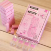 Tipple Topple Tower game box and shot glasses, on a wooden surface