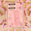 Tipple Topple Tower party game box with pink design, shot glasses, and block images