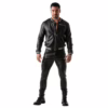 Man wearing a black leather pilot bomber jacket and fitted pants