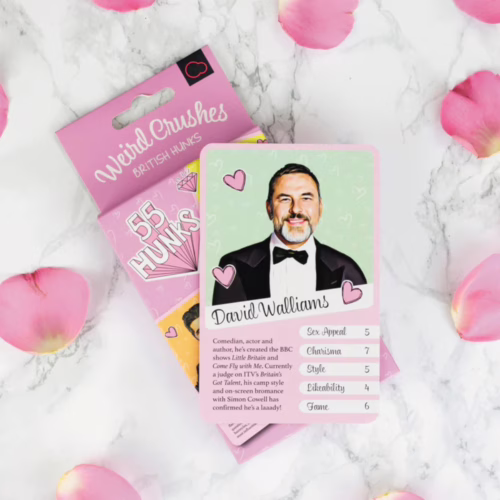 Discover the quirky charm of David Walliams in this collectible card from The Loving Company. David Walliams collectible card from Weird Crushes - British Hunks, with rose petals