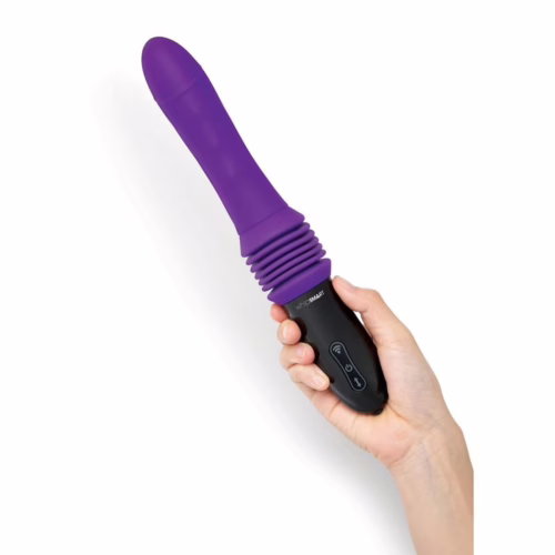 A purple vibrator held in hand