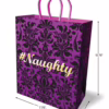This playful '#Naughty' gift bag is perfect for adding a fun twist to your gift-giving. A purple gift bag with a black damask pattern and the text '#Naughty' in gold